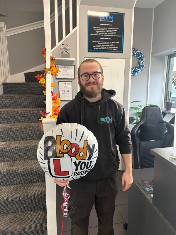 Josh Passed Driving Test close up with balloon